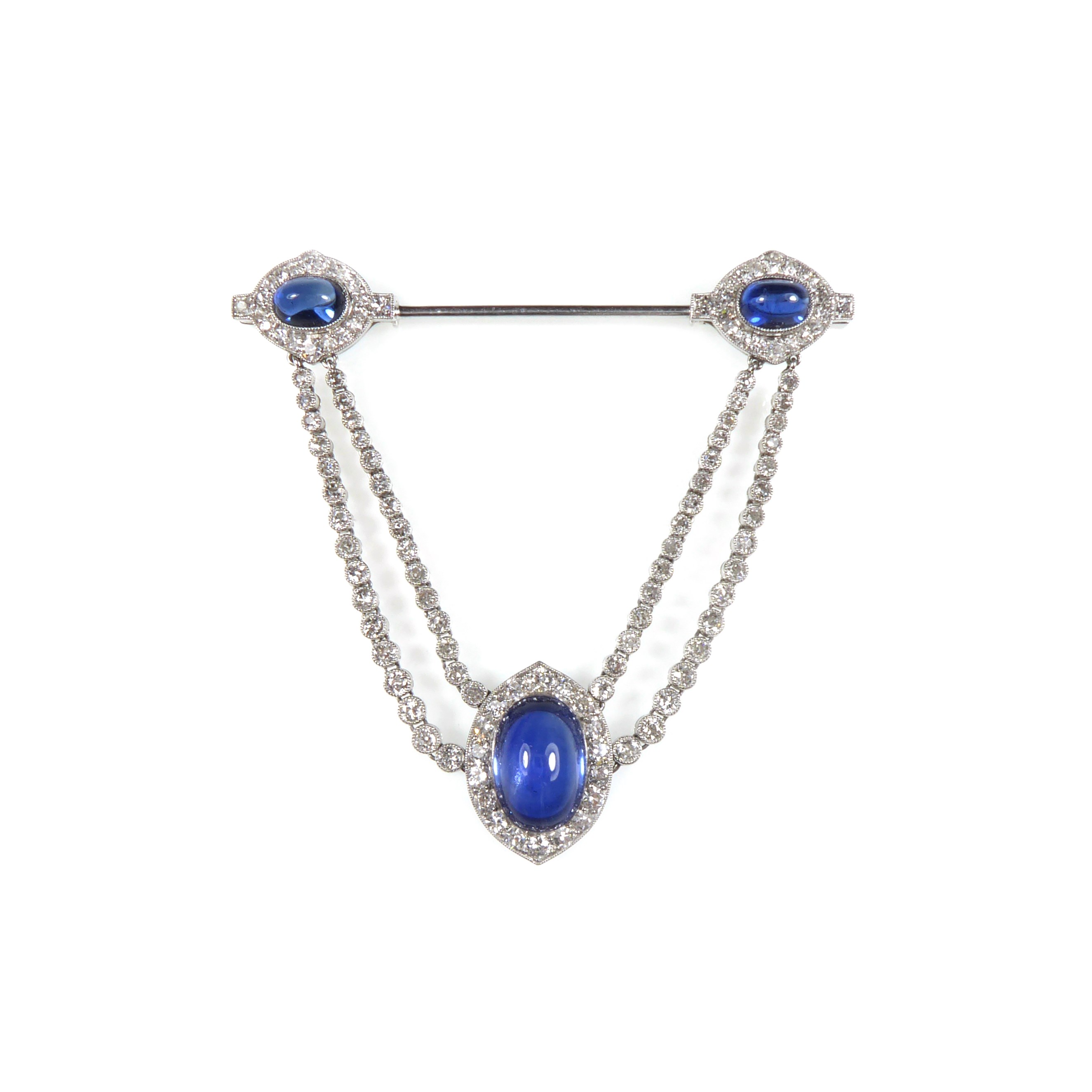 Early 20th century cabochon sapphire and diamond cluster swag