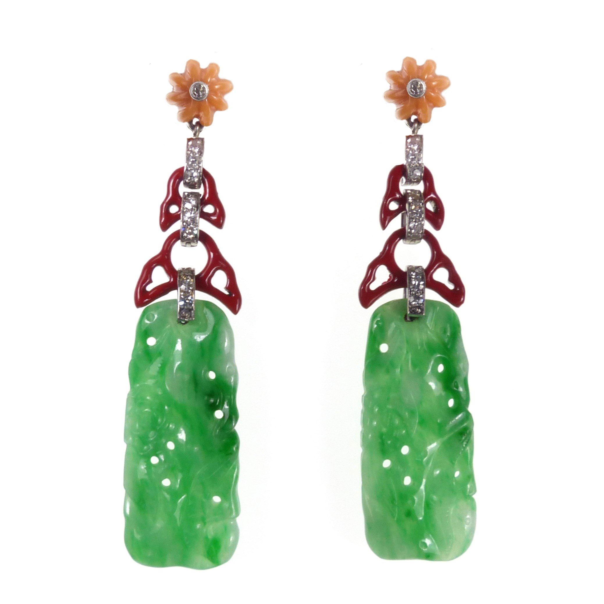 Pair of diamond enamel and jade panel pendant earrings by Cartier