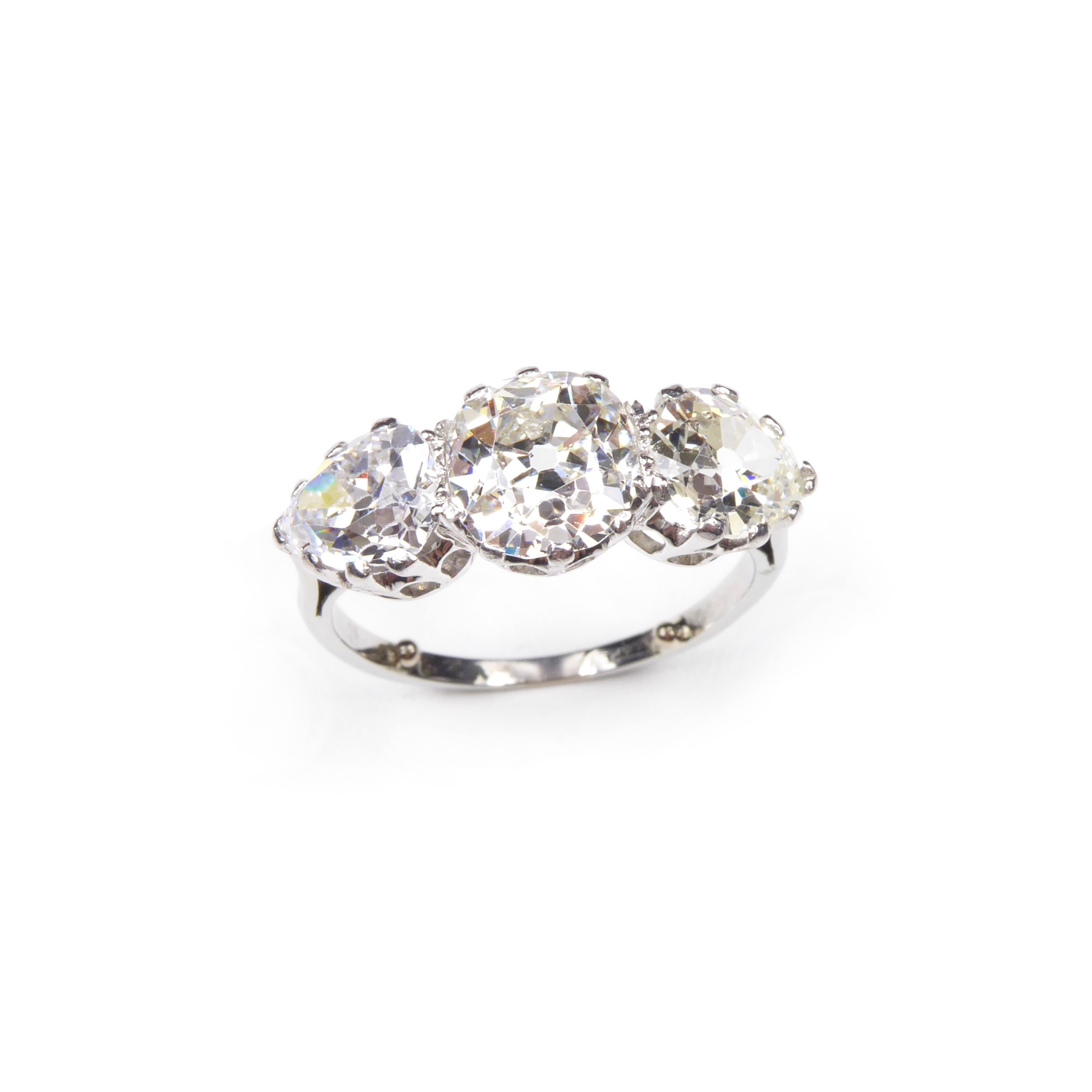 art deco three stone diamond ring