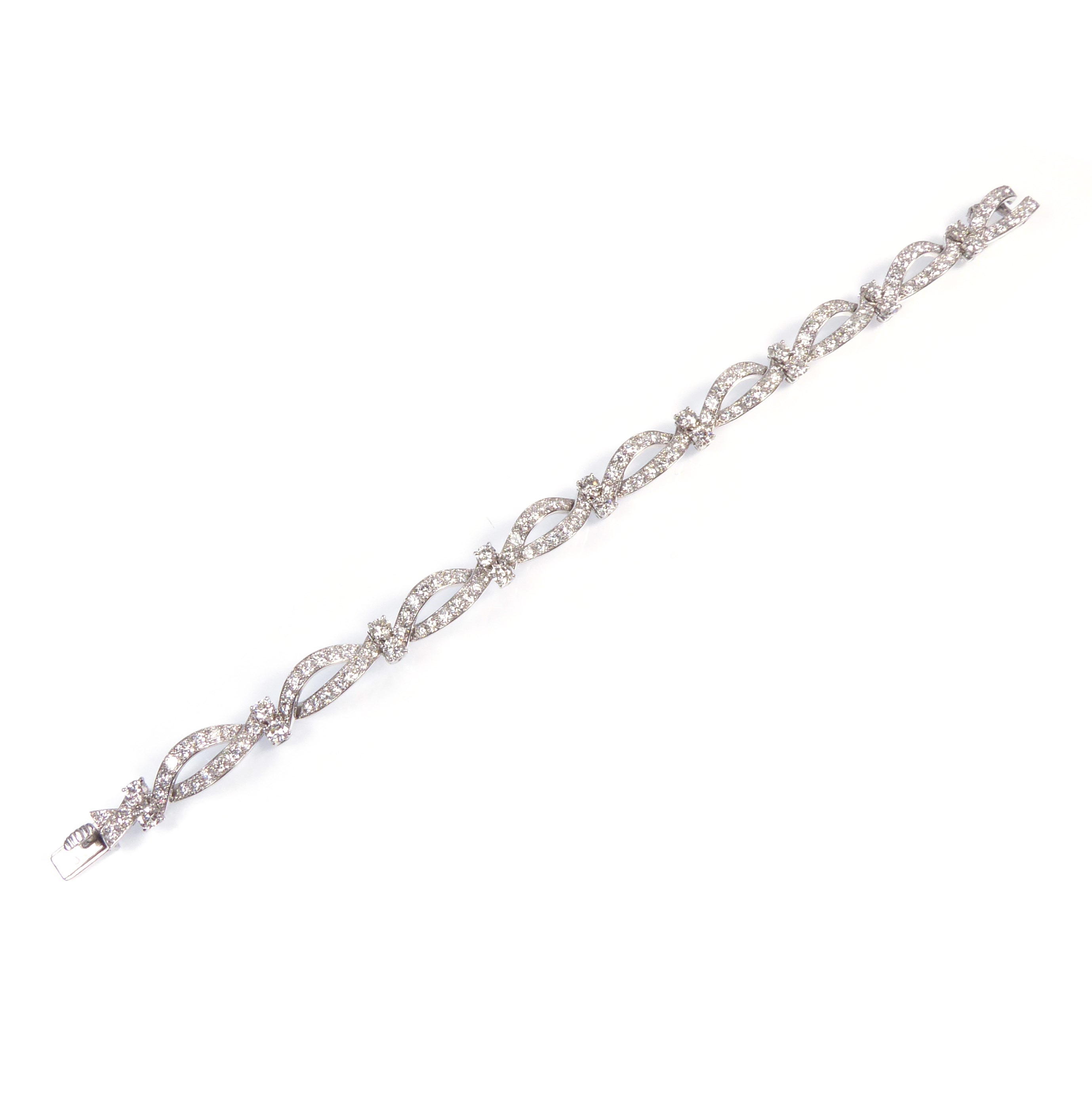 Diamond scroll bracelet forming navette links by Cartier Paris