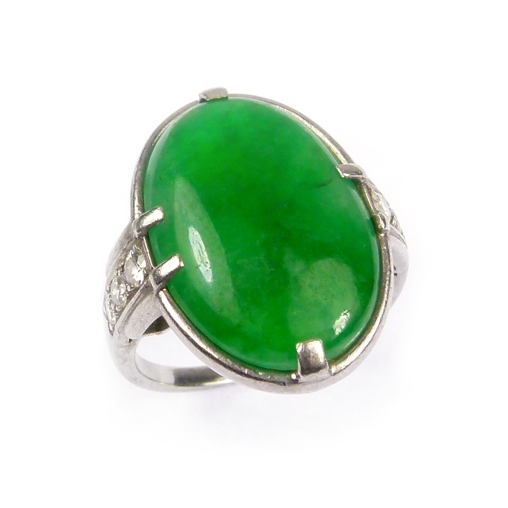 Single stone oval jade and diamond ring by Cartier Object